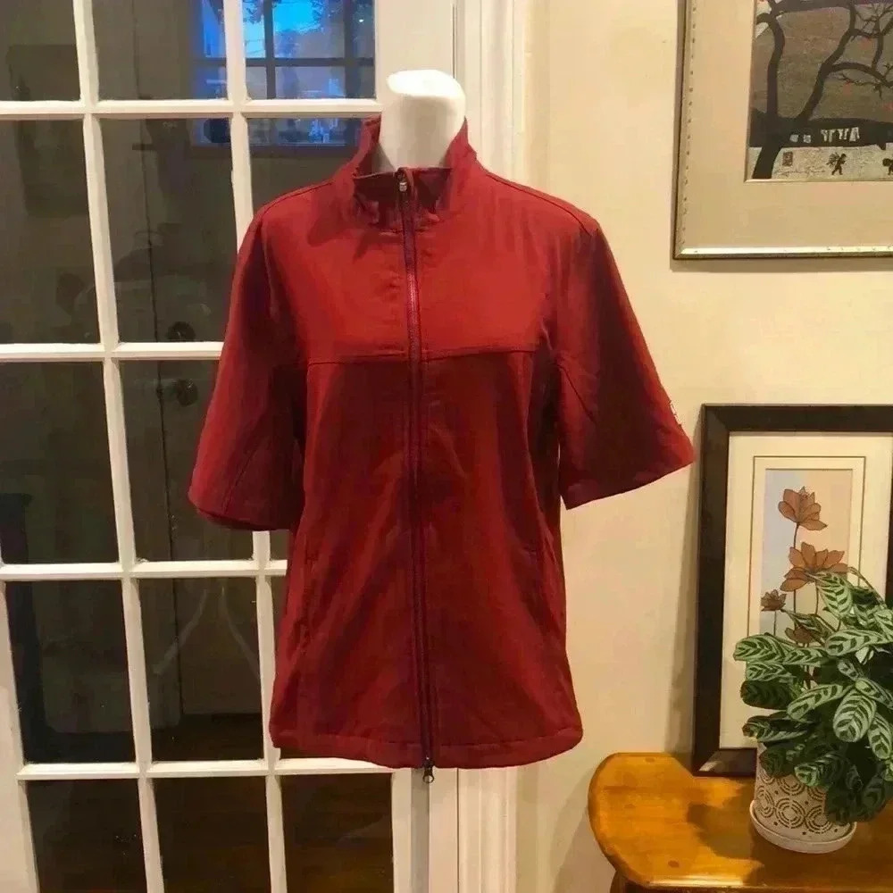 Kate Lord zippered golf shorts sleeve top